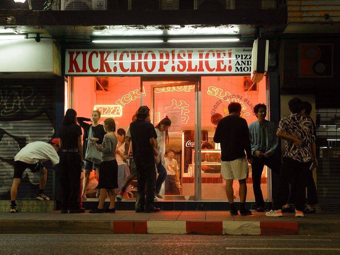 Crowd outside the shop at night